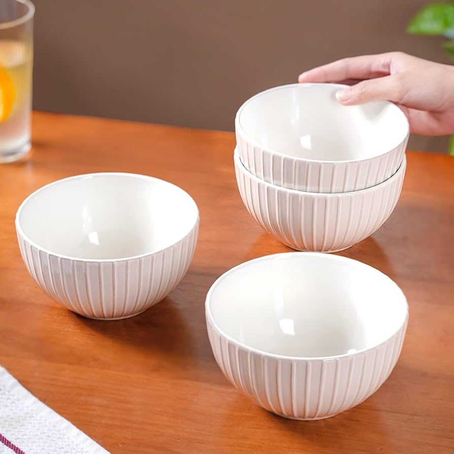 4 White ceramic bowls